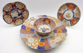 Large late 19th Century Japanese Imari pattern charger decorated with panels of flowers in orange,