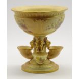 Royal Worcester centrepiece with a moulded bowl raised on a single knop stem issuing from 3