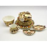 Four Royal Crown Derby Imari pattern tea cups and saucers, 3 tea plates, 2 bread and butter plates,
