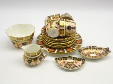 Four Royal Crown Derby Imari pattern tea cups and saucers, 3 tea plates, 2 bread and butter plates,