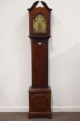 Edwardian mahogany longcase clock, arched pediment hood over a stepped arch glazed door,