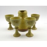 David Llloyd Jones (1928-1994) studio pottery jug H20cm and four goblets,