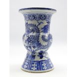 Late 19th Century Chinese vase of waisted baluster design decorated with dragons,