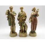Pair of Royal Dux male and female classical figures,