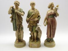 Pair of Royal Dux male and female classical figures,
