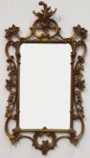 20th century gilt framed wall mirror, of scrolling floral design,