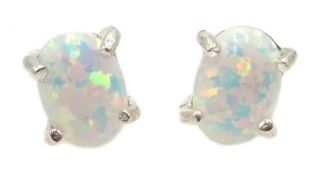 Silver oval opal stud earrings,