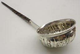 Toddy ladle with embossed bowl inset with a George II coin on twisted whalebone handle