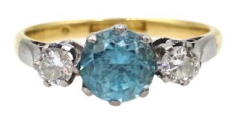 Three stone diamond and blue zircon gold ring,