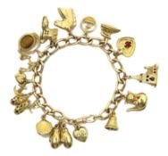 9ct curb chain bracelet, hallmarked with fifteen 9ct gold charms, 14ct gold 'E' charm,