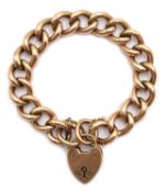 Gold cub chain bracelet with heart locket, stamped 9ct, approx 22.