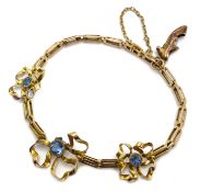 Edwardian gold blue stone set bow bracelet Rd.
