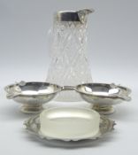 Edwardian cut glass water jug with silver collar,