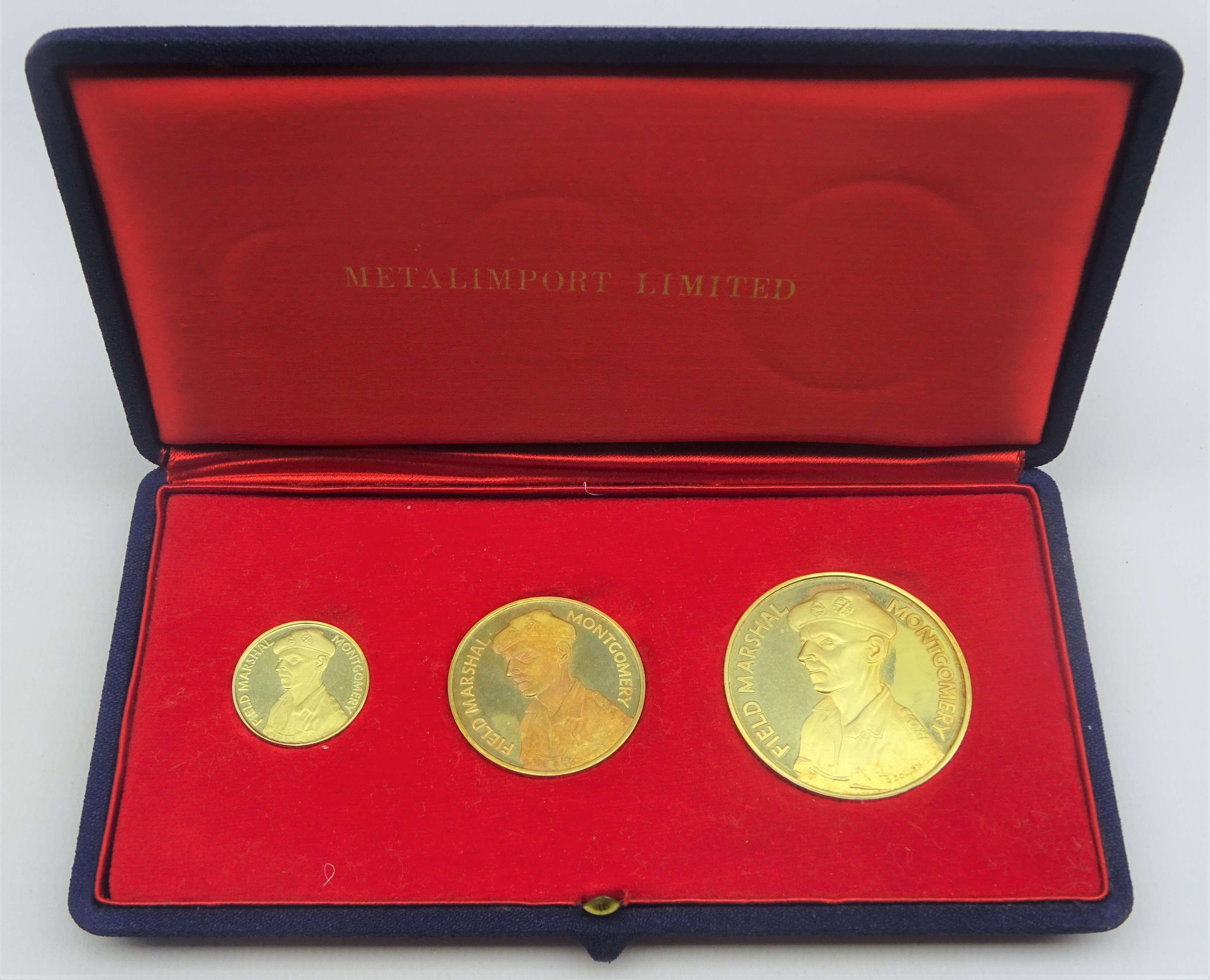 Set of three 18ct gold medals commemorating the 25th anniversary of Desert War,