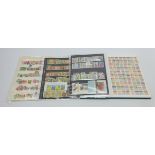 Japan - mainly older stamps in one stockbook and more modern material on stockcards and album pages,