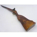 Ornamental Spanish style side-by-side double barrel shotgun, with carved wooden stock,