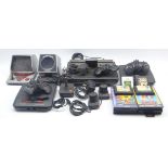 Atari 2600 Video Computer System with joystick, two paddles and three games cassettes,