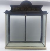 Rowntree's Chocolates white painted and mahogany shop counter-top display cabinet of oblong form