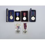 Elizabeth II Civil Defence Long Service medal and National Service medal, both boxed,