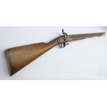 19th century flintlock converted to percussion cap muzzle loading gun with walnut full length stock,