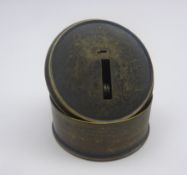 Brass cased drum shaped pocket sextant by Negretti and Zambra London with 5cm vernier arm and lens,