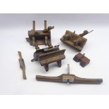 Three fruitwood plough style woodworking planes, stamped with various names,