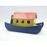 Tiger Toys wooden Noah's ark painted in blue and yellow with red lift-off roof containing seventeen