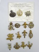 Fifteen cap badges including Liverpool Pals, Army Cyclists Corps, LRDG, Royal Naval Air Service,