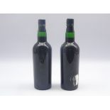Two bottles of Sandemans port 1966 Condition Report & Further Details <a