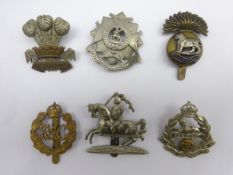 Six cap badges - Royal Munster Fusiliers, Beds & Herts Regiment, Leinster Regiment, East Lancashire,