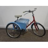 Child's Raleigh Lion tricycle in red and blue with spoked wheels and boot box H77cm L110cm