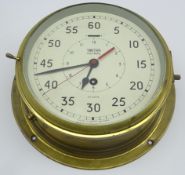 Smiths Astral ship's brass cased bulkhead clock, the painted 20cm dial with Arabic numerals,