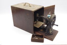 Late 19th Century Willcox & Gibbs chain stitch sewing machine with gilt decoration and in wooden