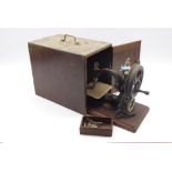 Late 19th Century Willcox & Gibbs chain stitch sewing machine with gilt decoration and in wooden