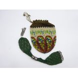 19th Century cut steel and silk miser's purse and a bead work draw string purse Condition