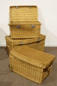 Three graduating rectangular wicker baskets, each with hinged lid and carry handle to each end,