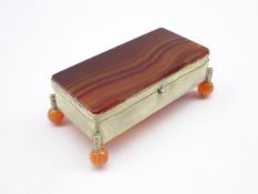 Plated rectangular casket with agate hinged cover and base and ball feet 9cm x 4.