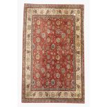 Persian design red ground rug, interlaced foliate decoration on red field, double guarded boarder,