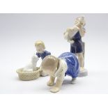 Royal Copenhagen figure of a boy holding a piglet No 4530 H18cm,