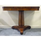 Late Regency rosewood tea table, fold over revolving top, hexagonal tapered column,