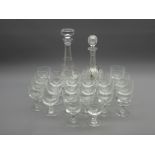 Fine cut glass decanter with silver 'Port' label, set twelve etched wine glasses,