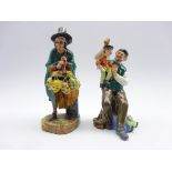Royal Doulton figures 'The Puppetmaker' HN2253 and 'The Mask Seller' HN2103 (2) Condition