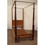 19th century mahogany four poster single bed, turned reeded supports carved with water leaves,