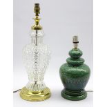 A glass column table lamp with metal mounts H39cm and a green glazed pottery lamp H28cm