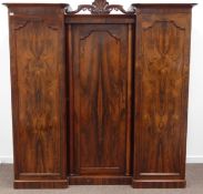 Early 19th century rosewood inverted breakfront triple wardrobe,