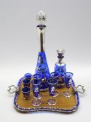 Venetian blue glass liqueur set with silvered decoration comprising 2 decanters,