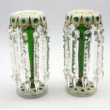 Pair of 19th Century Bohemian white and gilt overlaid green glass mantel vases hung with button and