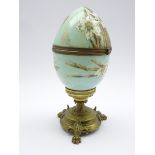 Victorian opaque glass lidded vase of egg shaped form enamelled and gilded with flowers and leaves,