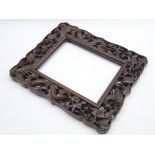 Late 19th/20th Century Chinese carved hardwood picture frame with dragon,