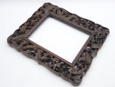 Late 19th/20th Century Chinese carved hardwood picture frame with dragon,